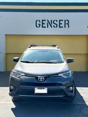 After: The Toyota's new bumper is expertly installed and painted, delivering a sleek, polished look.