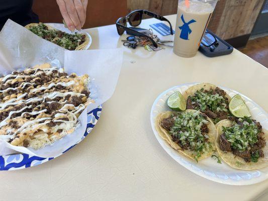 Carne asada fries, 3 Adobada and 3 Birra tacos