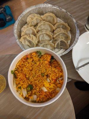 Chicken biryani (lamb momo in background)