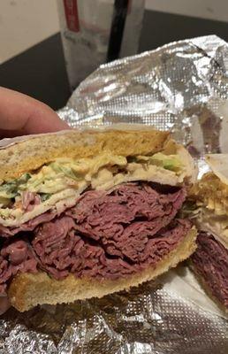 New Yorker sandwich (pastrami, corned beef, turkey, Russian coleslaw on toasted rye)