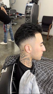 Mid Fade w/ Slickback Style on Top