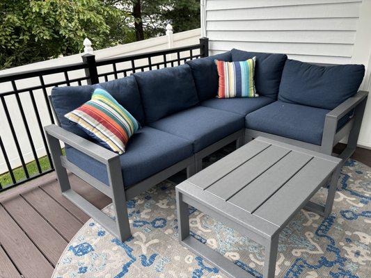 Polywood sectional seating and coffee table.