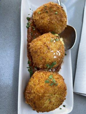 Arancini. Crispy crust. Sauce was a little too sour.