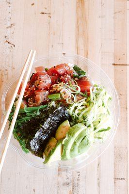 SASSY TUNA: Hawaiian ahi tuna, sesame shoyu, avocado, mixed seaweed salad, nori, jalapeños, cucumbers, scallions