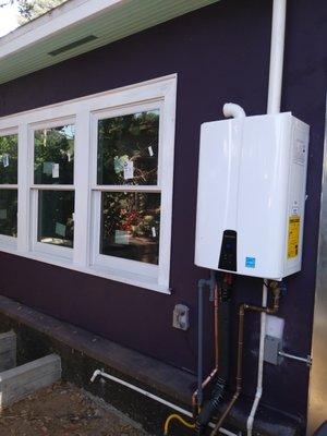 An exterior Tankless water heater, Navien.