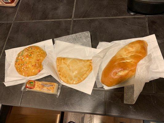 pastries. to the left , confetti cookie middle one is my favorite pineapple empanadas, and then lastly jalapeño and cream cheese