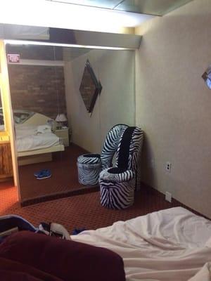 Yes a high heel chair and giant mirror facing your bed!!