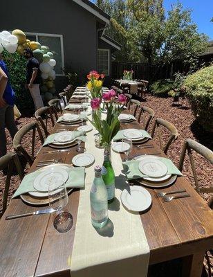 Farm tables, crossback chairs, plates, goblets, utensils and linens from Danny Thomas