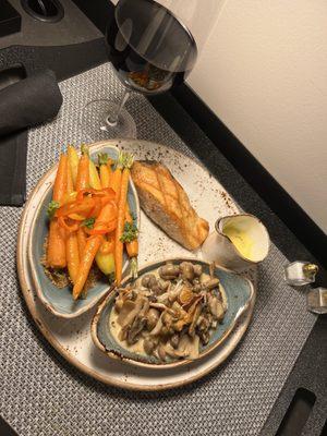 7 oz. King Salmon with honey roasted baby carrots and sautéed wild mushrooms (in-room dining)