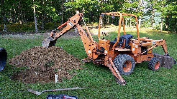 Septic tank locate and uncover.