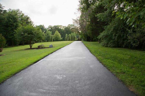 Asphalt Road Leading Up To Home