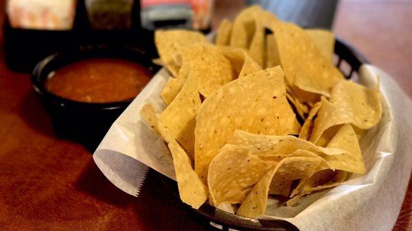 There chips come with warm hot sauce. I prefer mine chilled. The chips were thick and hearty meant for thicker sauce.