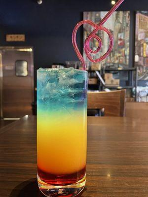 Try out our newest cocktail today! The sunset consist of Grenadine, soju, pineapple orange juice, and blue curaçao