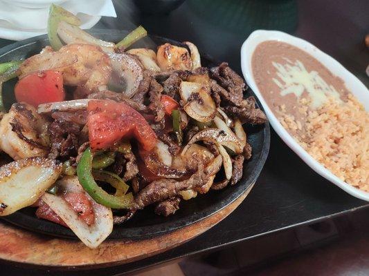 Steak and Shrimp Fajitas refried beans and rice