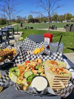 Buffalo chicken wrap with a hearty side salad!