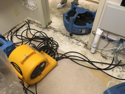 Water damage at a Dental office. Because of the fragile equipment in the walls a minimally invasive injection compression system was used