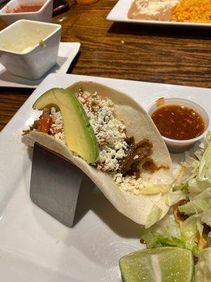 1 Carnitas (Shredded Pork) Taco with pico de Gallo avocado and queso fresco