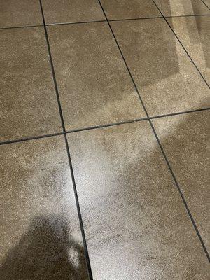 Residue / grease on the floors