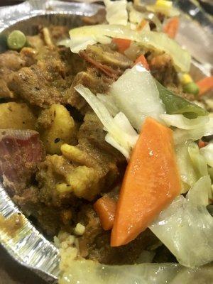 Curry goat with mix veggies and rice & beans