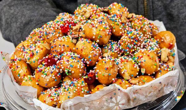 Struffoli - Italian honey balls - fried dough, light dip in honey syrup