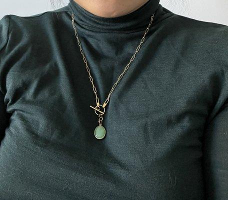 Custom modern jade necklace with a toggle lock and paper clip chain.