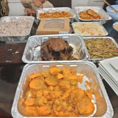 Salmon shrimp roasted chicken rice and beans yams green beans potato salad