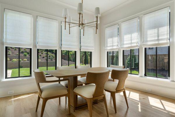 Our customer transformed their breakfast room with our custom Roman shades, perfectly tailored for their beautiful Atlanta home.