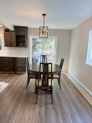 Frankie and Stephanie help match the floors to the cabinets.