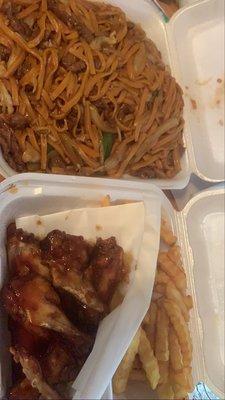 Lo mein and chicken wings.