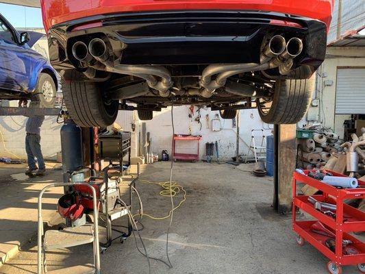 Muffler delete on a 2017 Camaro SS. The original muffler flaps were left in place.