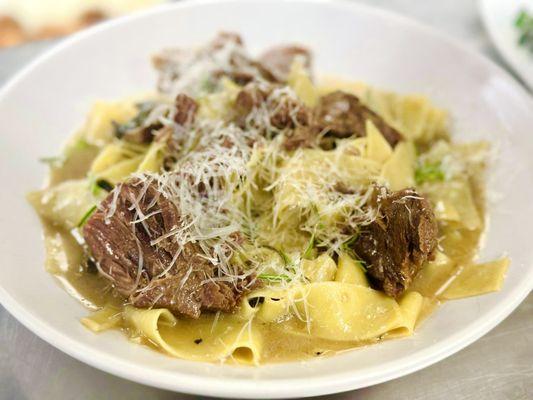 Garlic, Rosemary, Sautéed with Short Ribs and Portobello Mushrooms in a Port Red Wine Sauce tossed in a Pappardelle Pasta