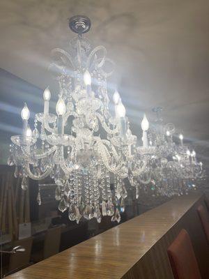 Gorgeous Chandeliers over manicuring tables