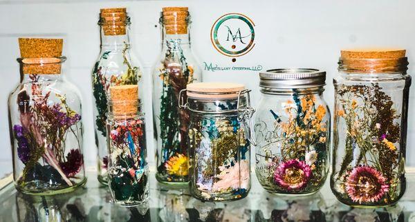 Dried florals in vintage bottles