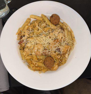 Bourbon St. Medley
 sautéed shrimp, chicken and sausage in a cajun alfredo sauce tossed with penne noodles