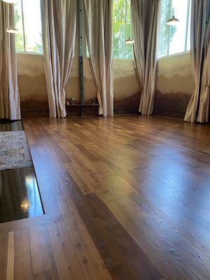 Full Bodied Yoga Reclaimed Redwood Flooring and floor to ceiling curtains