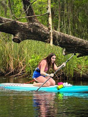 Paddle boarding on calm waters