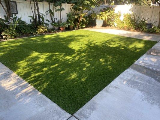 Artificial turf new and-concrete patio