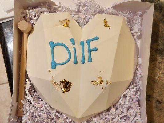 The "Dilf" smash cake that the wife got me for Father's day. It was filled with lots of yummy treats!