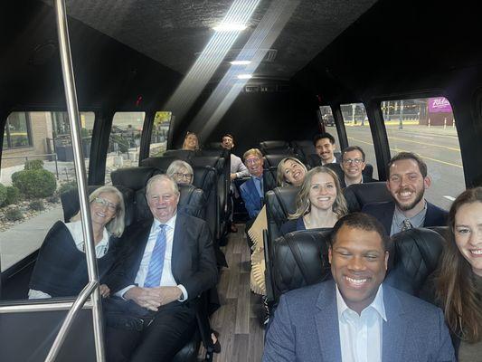 All smiles on the Sleek Shuttle Bus