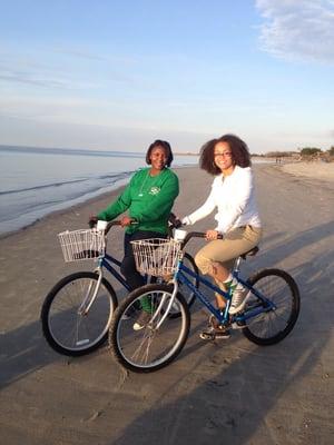 Bike riding on the beach at sunset- perfect!