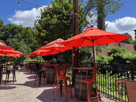 Excellent patio tables with plenty of space and a beer with a view.