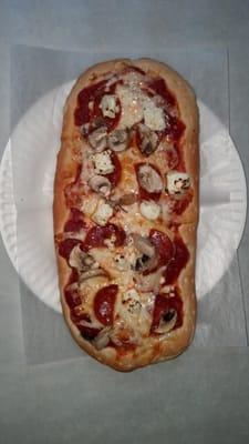 Flatbed pizza.. great for lunch or your starter plate. Made fresh to order under 7 mins.. yummy