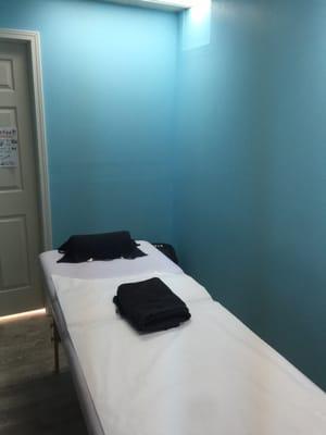 The waxing room where I received my services. Simple, clean, and fast.