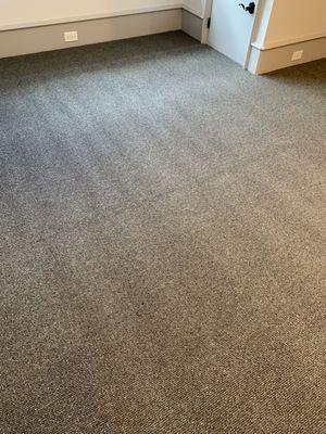 The wavy wool carpet that just needs to settle- well it still looks like this months later even when they "steamed" it