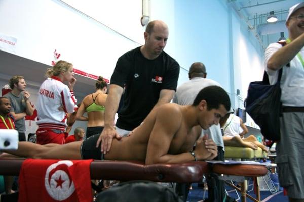 Dr. Blum working on Ous Mellouli in China at World Championships