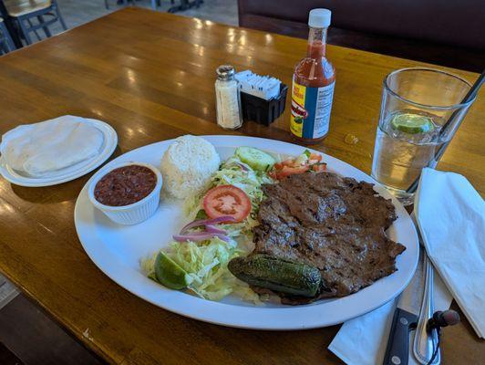 Carne asada meal. Water.