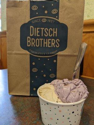 Blueberry pie and butter pecan ice cream backed by a bag of delicious goodies