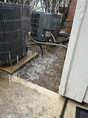 Water from the gutter that seeps inside apartment, not pictured but the water also comes in from the front door