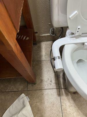 Unclean bathroom floor