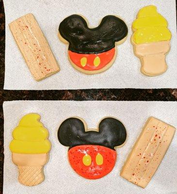 Disney themed cookies, Dole Whip, Mickey cookie, and churro.